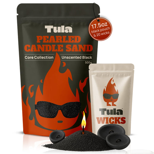 Refillable candle kit / candle sand kit. Tula Black Pearled Candle Sand packaging with 500g unscented wax pearls, cotton wicks, and flame display. Clean white background. Highlighting refillable, reusable, plant-based candle alternative for home decor, rituals, and gifting.